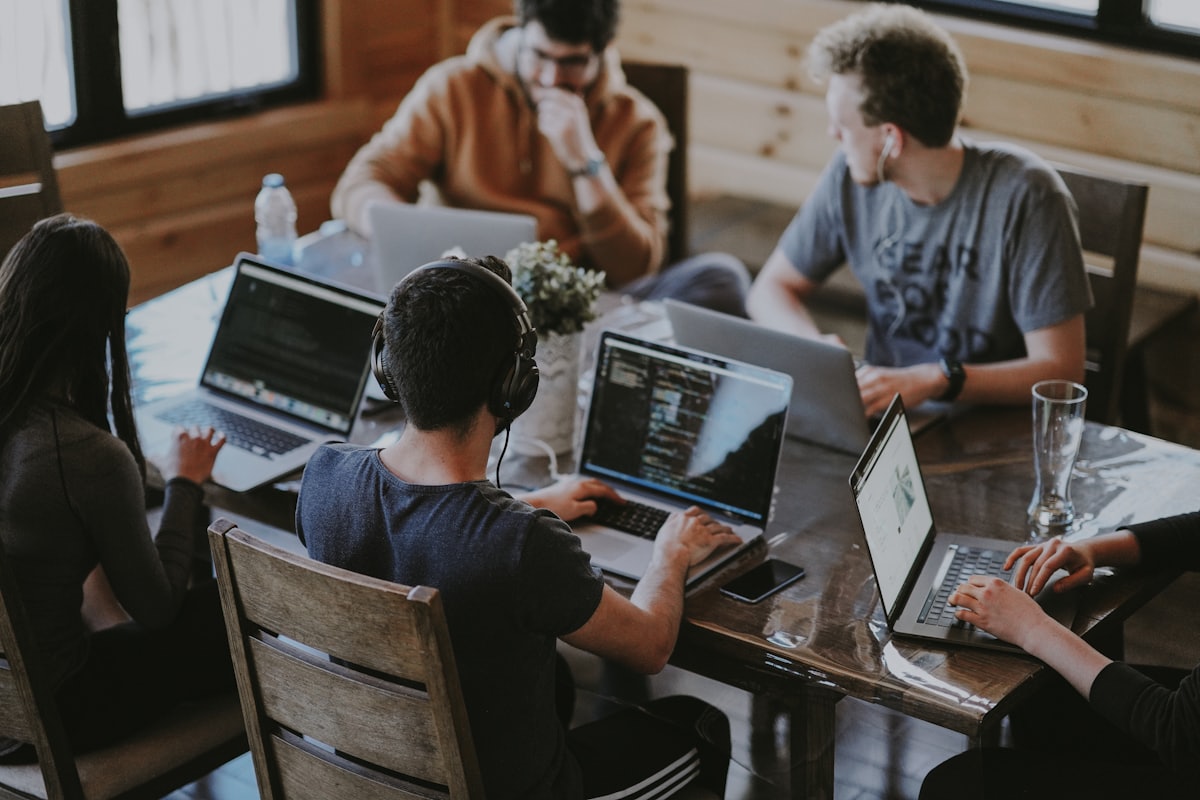 Software engineers working together at a desk